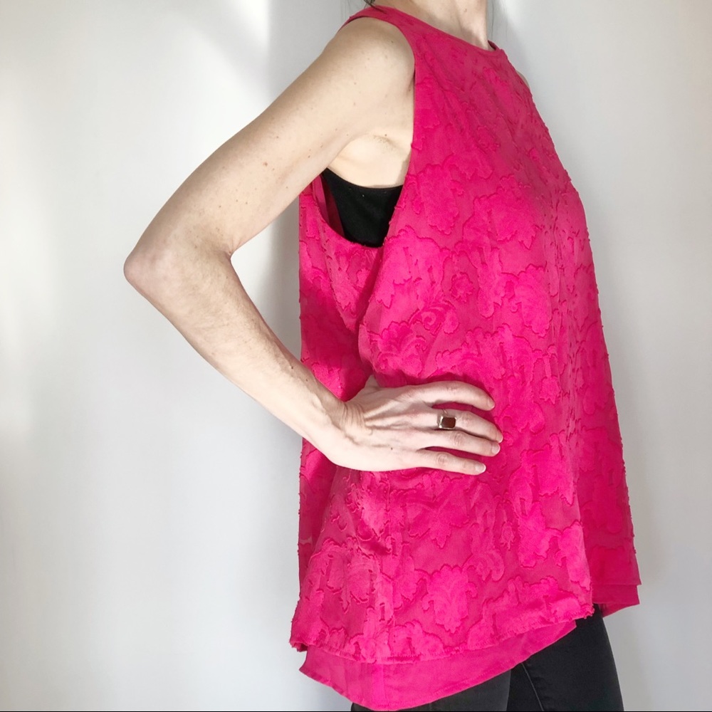 Pretty bright pink pattered blouse. New with tags.
